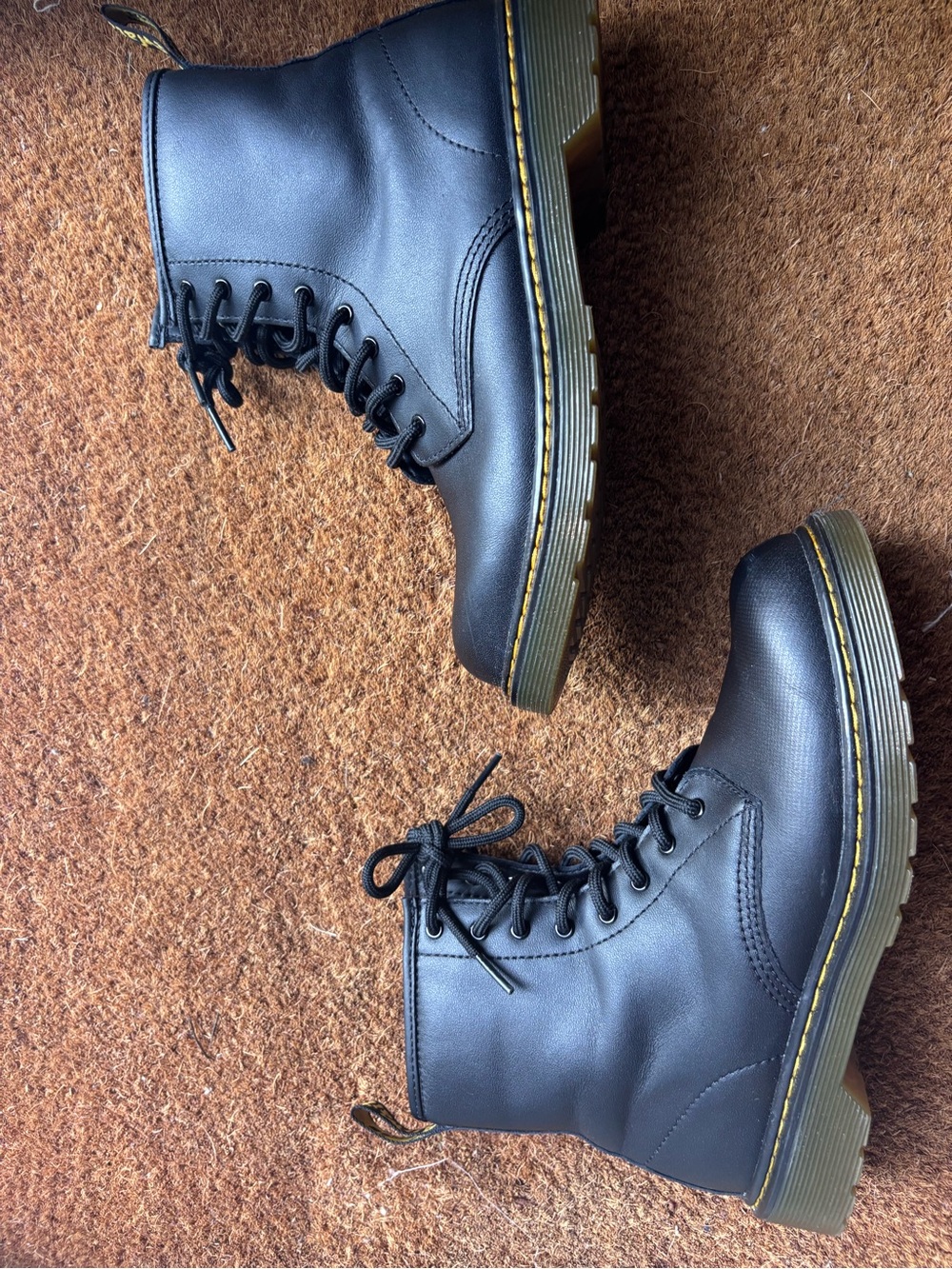 Dr. Martens Black Lace-Up Boots with Yellow Welt Stitching